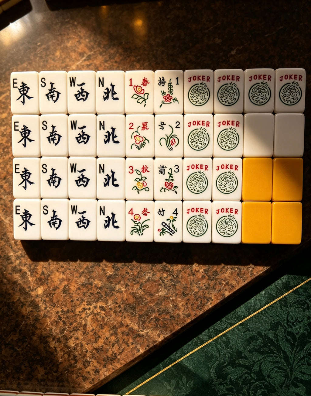 MAHORA 7-Layer: Winds, flowers, jokers and orange-backed tiles viewed from above