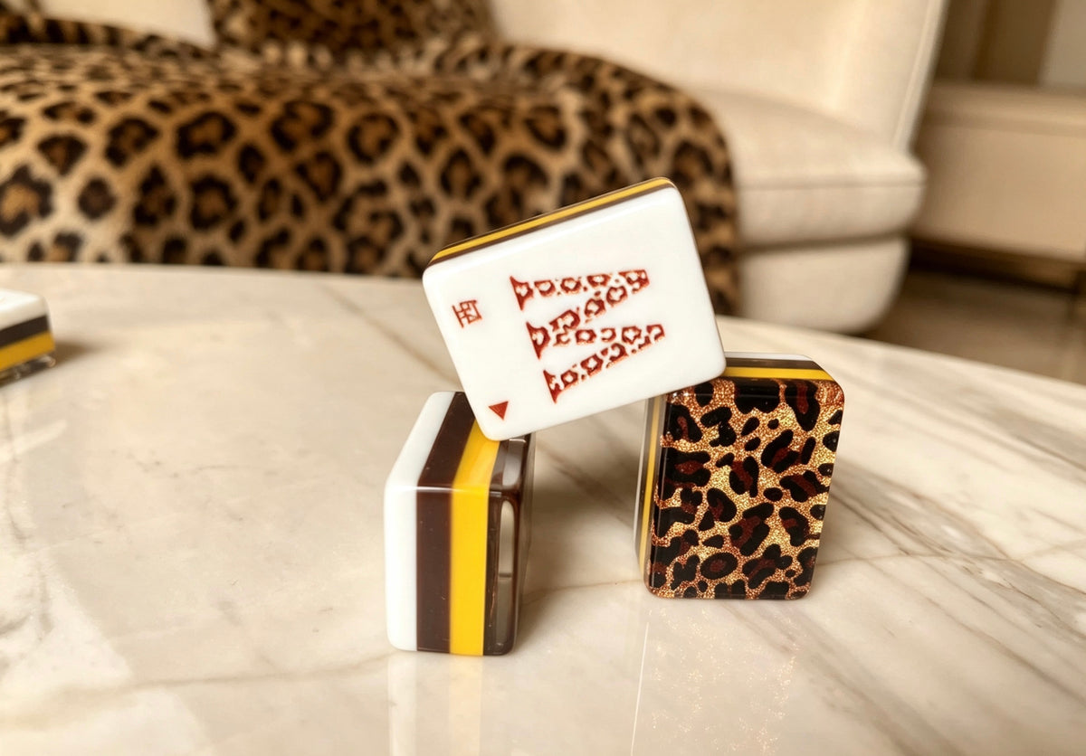 MAHORA Leopard Print: Joker face beside leopard backs and a layered tile edge