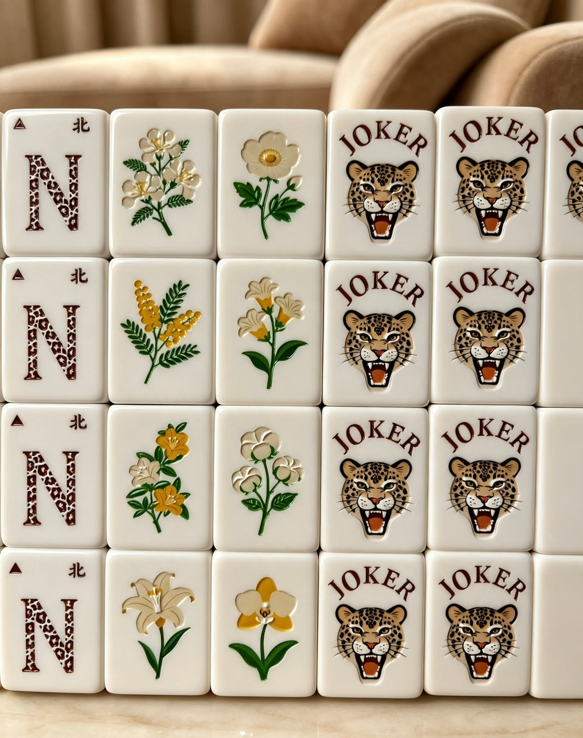 MAHORA Leopard Print: Close-up of wind letters, flowers and leopard joker faces