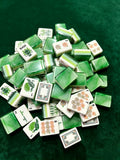 MAHORA Emerald: Green marbled tile backs and white faces on green fabric